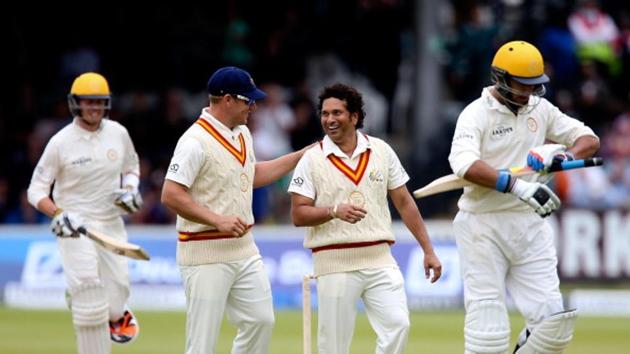 Sachin Tendulkar of MCC celebrates with team mate Arron Finch after dismissing Yuvraj Singh of Rest of the World (R) during the MCC and Rest of the World match at Lord's Cricket Ground on July 5, 2014 in London, England.(Getty Images) Sachin Tendulkar of MCC celebrates with team mate Arron Finch after dismissing Yuvraj Singh of Rest of the World (R) during the MCC and Rest of the World match at Lord's Cricket Ground on July 5, 2014 in London, England.(Getty Images)