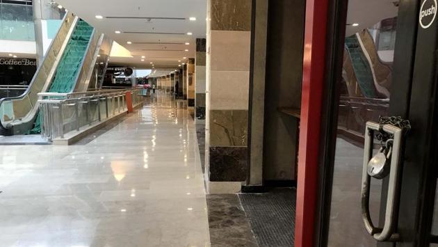 A closed shop seen inside Ambience Mall where mall officials said that around 5,000-7,000 people visited on July 1, which is around 20-25% of the footfall they would have received on a normal day before the Covid-19 pandemic. (Parveen Kumar / HT Photo)