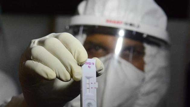 A doctor holds the Covid-19 antigen testing kit, at Naidu Hospital, in Pune, India, on Wednesday, July 1, 2020. (Shankar Narayan/ Hindustan Times) A doctor holds the Covid-19 antigen testing kit, at Naidu Hospital, in Pune, India, on Wednesday, July 1, 2020. (Shankar Narayan/ Hindustan Times)