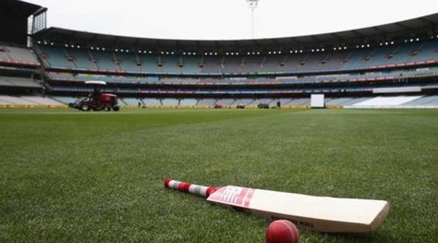 A bat and ball are seen on the turf.(Getty Images)