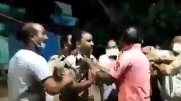 Police said that BJP leader Surendra Patel, along with over half a dozen people, reached the spot and beat up the police personnel. (Videograb) Police said that BJP leader Surendra Patel, along with over half a dozen people, reached the spot and beat up the police personnel. (Videograb)
