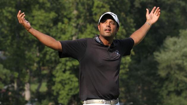 Arjun Atwal reacts on the 18th hole after winning the Wyndham Championship at Sedgefield Country Club(Getty Images)