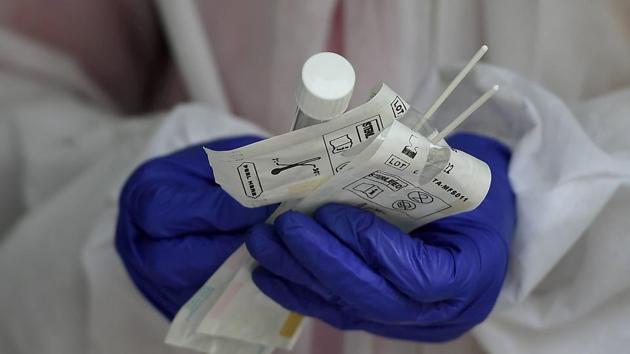 A health worker prepares to collect samples for COVID-19 swab testing, at a medical camp in Chennai. Tamil Nadu’s high case load must be seen in relation to another important figure: its testing numbers. As of July 3, a total of 1.27 million people have been tested in 91 testing facilities, which is the highest in the country in absolute numbers. (PTI)