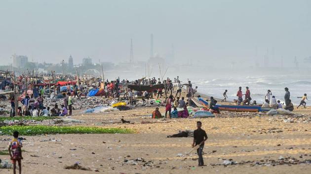 Fishermen seen near the Pattinapakkam beach during an intensified lockdown, in wake of the coronavirus pandemic in Chennai on July 2. Experts said the high numbers can also be attributed to the movement of people across the state post Unlock 1 which started on June 8. (R Senthiil Kumar / PTI)