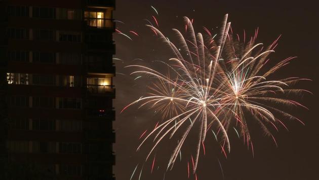 Kansas City: A Fourth of July fireworks display lights up the sky beyond an apartment building, Friday, July 3, 2020, in downtown Kansas City, Mo. (AP) Kansas City: A Fourth of July fireworks display lights up the sky beyond an apartment building, Friday, July 3, 2020, in downtown Kansas City, Mo. (AP)