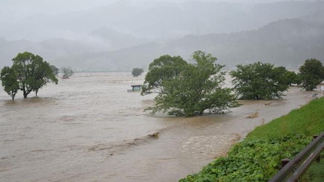 Rising water caused by heavy rain is seen at Kuma river in Yatsushiro, Kumamoto prefecture on July 4, 2020. (AFP) Rising water caused by heavy rain is seen at Kuma river in Yatsushiro, Kumamoto prefecture on July 4, 2020. (AFP)