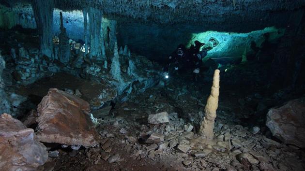 The image shows a diver in the "La Mina Roja" passage of the Sagitario underwater cave system. (AP) The image shows a diver in the "La Mina Roja" passage of the Sagitario underwater cave system. (AP)