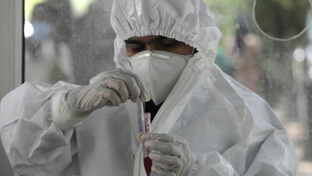 A health worker conducts a COVID-19 test, at Sector 30 District Hospital, in Noida, India, on Friday, 03 July, 2020. (Representational ) (Sunil Ghosh / Hindustan Times) A health worker conducts a COVID-19 test, at Sector 30 District Hospital, in Noida, India, on Friday, 03 July, 2020. (Representational ) (Sunil Ghosh / Hindustan Times)