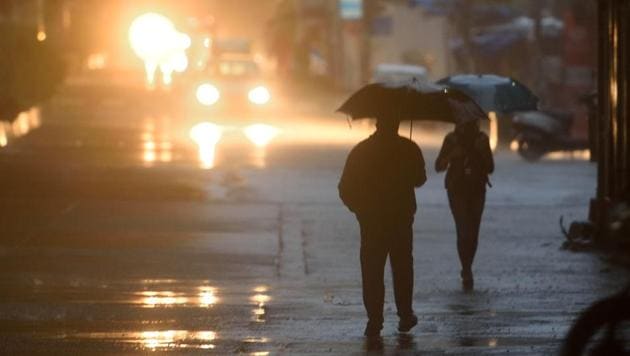 People deal with rain at Andheri Subway in Mumbai, India, on Saturday, July 4, 2020. (Satish Bate/HT Photo) People deal with rain at Andheri Subway in Mumbai, India, on Saturday, July 4, 2020. (Satish Bate/HT Photo)