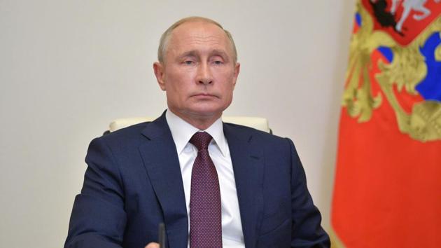 Russia's President Vladimir Putin looks on as he attends a video conference with the working group on amendments to the Russian constitution at the Novo-Ogaryovo residence, outside Moscow on July 3, 2020. (AFP) Russia's President Vladimir Putin looks on as he attends a video conference with the working group on amendments to the Russian constitution at the Novo-Ogaryovo residence, outside Moscow on July 3, 2020. (AFP)
