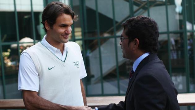 LONDON, ENGLAND - JUNE 25: Cricket player Sachin Tendulkar (R) shakes hands with tennis player Roger Federer on Day Six of the Wimbledon Lawn Tennis Championships at the All England Lawn Tennis and Croquet Club on June 25, 2011 in London, England. (Photo by Oli Scarff/Getty Images)(Getty Images)