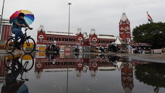 Puratchi Thalaivar Dr MGR Central railway station is reflected on a water logged road in Chennai. The total number of patients who have recovered from the deadly pathogen has risen to 58,378, with 2,357 people being discharged from medical facilities on July 3. (PTI)