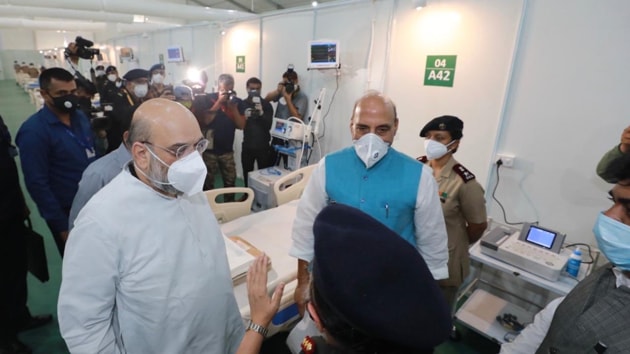 Home minister Amit Shah seen with defence minister Rajnath Singh at the Covid facility in Delhi.(Photo: AmitShah/ Twitter)
