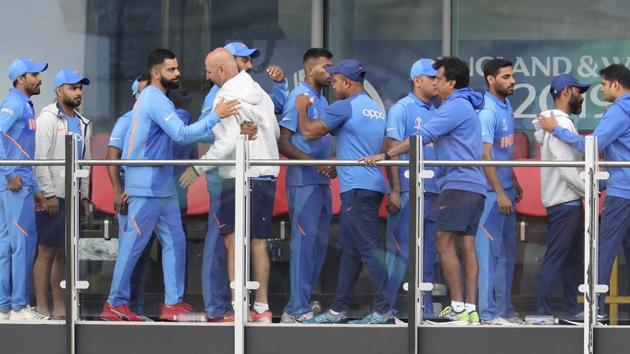 Indian cricketers greet each other (AP) Indian cricketers greet each other (AP)