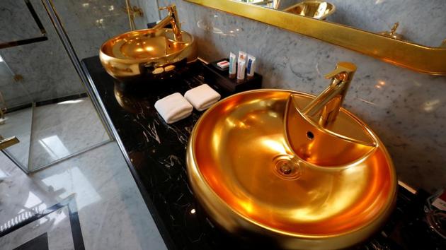 Gold plated bathroom sinks are seen in the newly-inaugurated Dolce Hanoi Golden Lake luxury hotel, after the government eased a nationwide lockdown following the global outbreak of the coronavirus disease (COVID-19), in Hanoi, Vietnam. (REUTERS/Kham)