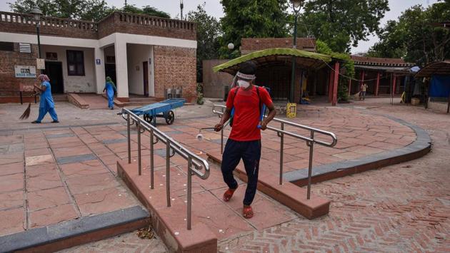 The Dilli Haat premises at INA being disinfected on July 4. The Delhi tourism department had on July 3 announced that all three centres of Dilli Haat, Nature Bazaar, The Garden of Five Senses, Azad Hind Gram and GTB Memorial would open the following day and that no entry fee would be charged for the first 15 days to promote footfall. (Biplov Bhuyan/HT PHOTO) The Dilli Haat premises at INA being disinfected on July 4. The Delhi tourism department had on July 3 announced that all three centres of Dilli Haat, Nature Bazaar, The Garden of Five Senses, Azad Hind Gram and GTB Memorial would open the following day and that no entry fee would be charged for the first 15 days to promote footfall. (Biplov Bhuyan/HT PHOTO)