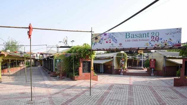 Nature Bazaar in Chhatarpur, another exhibition space for handicrafts and artisanal goods, bore much the same look as the venerable Delhi Haat on opening day. With little by way of footfall due to concerns over the coronavirus in public spaces, stall owners were already grappling with the concern of having to pay rent in times of little to no business. (Biplov Bhuyan / HT Photo) Nature Bazaar in Chhatarpur, another exhibition space for handicrafts and artisanal goods, bore much the same look as the venerable Delhi Haat on opening day. With little by way of footfall due to concerns over the coronavirus in public spaces, stall owners were already grappling with the concern of having to pay rent in times of little to no business. (Biplov Bhuyan / HT Photo)