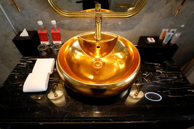 A gold plated bathroom sink is seen in the newly-inaugurated Dolce Hanoi Golden Lake luxury hotel, after the government eased a nationwide lockdown following the global outbreak of the coronavirus disease (COVID-19), in Hanoi, Vietnam. (REUTERS/Kham)
