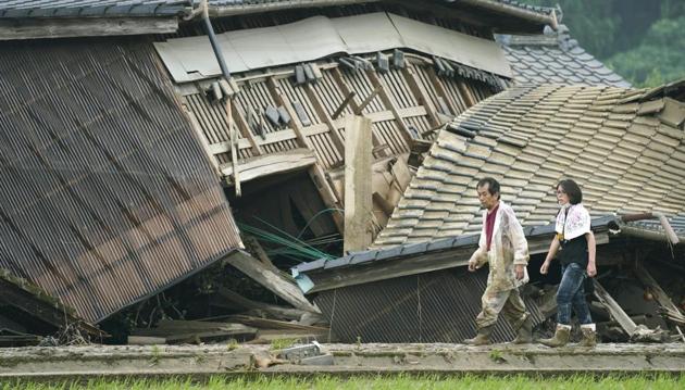 Heavy rain in the Kumamoto region triggered flooding and mudslides Saturday and left dozens still being stranded at their homes and other facilities. (AP photo) Heavy rain in the Kumamoto region triggered flooding and mudslides Saturday and left dozens still being stranded at their homes and other facilities. (AP photo)