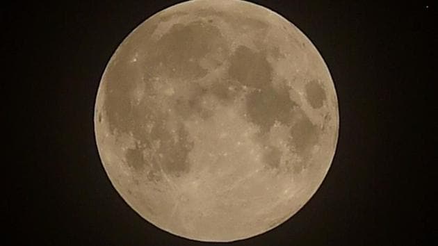 A penumbral lunar eclipse occurs when the moon travels through the faint penumbral portion of the earth’s shadow.(PTI)