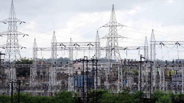 According to power ministry data, peak power demand met was recorded at 170.54 GW on July 2, which is just 2.61 per cent lower than 175.12 GW in July 2019.(Diwakar Prasad/ Hindustan Times)