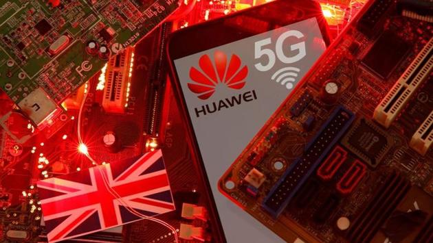 The British flag and a smartphone with a Huawei and 5G network logo are seen on a PC motherboard in this illustration picture.(REUTERS)