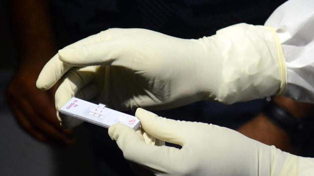 A medical professional holds a Covid-19 antigen testing kit at Naidu Hospital in Pune. Maharashtra’s Case Fatality Rate (CFR) stands at 4.27%, against the national rate of 2.88%. (Shankar Narayan / HT Photo) A medical professional holds a Covid-19 antigen testing kit at Naidu Hospital in Pune. Maharashtra’s Case Fatality Rate (CFR) stands at 4.27%, against the national rate of 2.88%. (Shankar Narayan / HT Photo)
