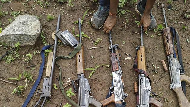 Arms and ammunition recovered after four Maoists were gunned down during an exchange of fire with security forces in a dense forest, in Kandhamal district on July 5, 2020.(PTI Photo)