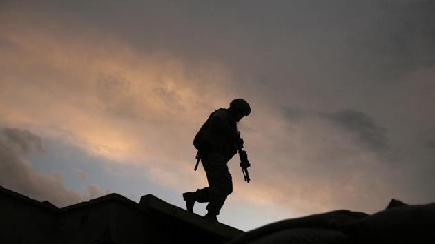 A soldier from the US Army respond to shots fired at a combat outpost in the Jalrez Valley in Afghanistan's Wardak Province.(AP) A soldier from the US Army respond to shots fired at a combat outpost in the Jalrez Valley in Afghanistan's Wardak Province.(AP)