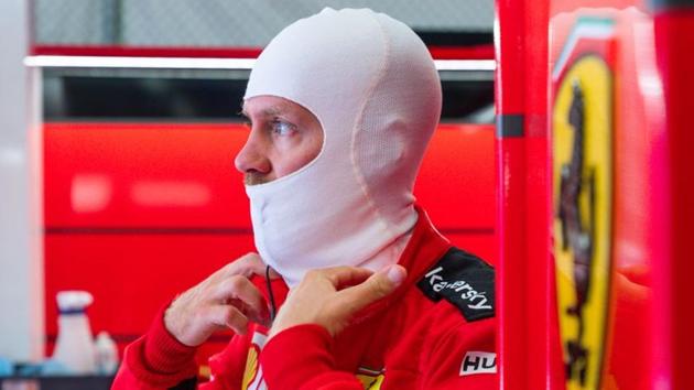 Ferrari's Sebastian Vettel in the pit lane.(REUTERS) Ferrari's Sebastian Vettel in the pit lane.(REUTERS)