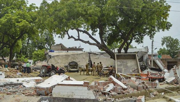 Debries lie on the ground after demolition of the residence of main accused in the Kanpur encounter case, Vikas Dubey, in Kanpur, on Sunday. (PTI) Debries lie on the ground after demolition of the residence of main accused in the Kanpur encounter case, Vikas Dubey, in Kanpur, on Sunday. (PTI)