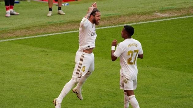 Real Madrid's Sergio Ramos celebrates scoring their first goal, as play resumes behind closed doors following the outbreak of the coronavirus disease (COVID-19) REUTERS/Vincent West(REUTERS)