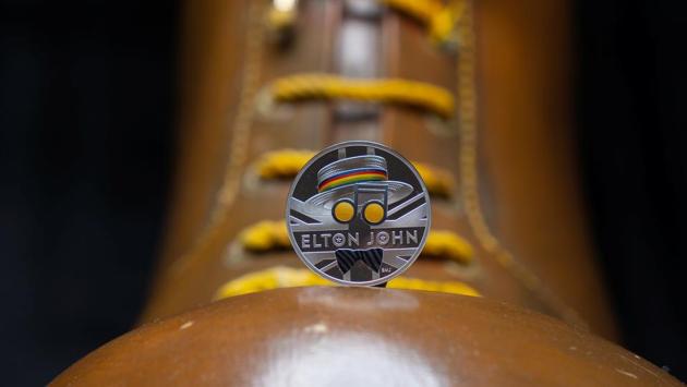The coin sits on top of the boots worn by Elton John, acting as the Pinball Wizard in the musical film 'Tommy' in 1975, from the new competitive Elton John coin collection released by Britain's Royal Mint. (via REUTERS) The coin sits on top of the boots worn by Elton John, acting as the Pinball Wizard in the musical film 'Tommy' in 1975, from the new competitive Elton John coin collection released by Britain's Royal Mint. (via REUTERS)