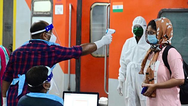 A passenger being tested with Thermal check after arriving at Thiruvananthapuram railway station through special train services during the ongoing lockdown amid coronavirus pandemic in Thiruvananthapuram in May 2020.(ANI File Photo)