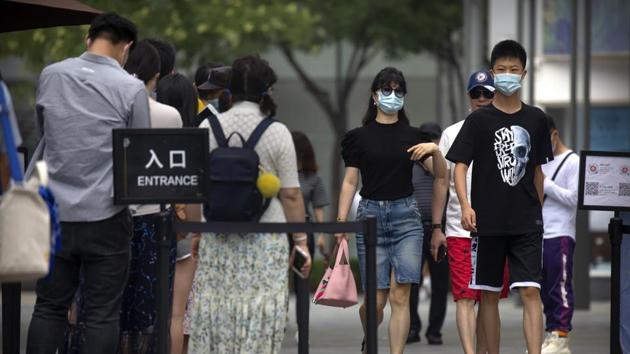Masks may be needed indoors, even in socially distant settings. (AP file photo) Masks may be needed indoors, even in socially distant settings. (AP file photo)