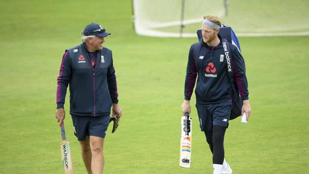 England cricket team captain Ben Stokes, right, speaks with coach Chris Silverwood during a nets session at the Ageas Bowl in Southampton, England, Monday July 6, 2020. England are scheduled to play West Indies in their first Test match July 8 - 12. (Stu Forster/Agency Pool via AP)(AP)