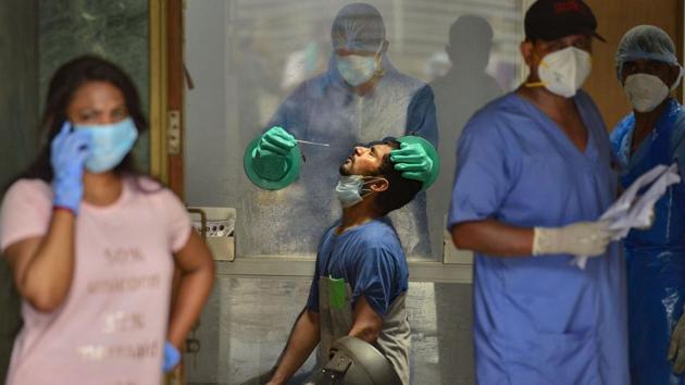 Senior government officials said the dip in the number of tests conducted on July 5 was because it was a Sunday. Government data confirmed the trend. (PTI Photo) Senior government officials said the dip in the number of tests conducted on July 5 was because it was a Sunday. Government data confirmed the trend. (PTI Photo)