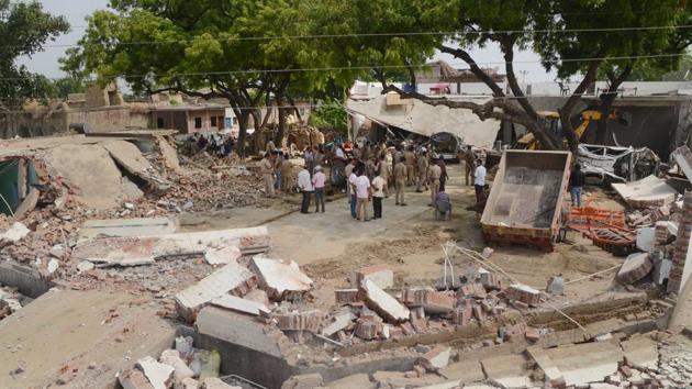 Kanpur: Debris lie on the ground following the demolition of the residence of criminal Vikas Dubey, after an encounter in Bikaru village where 8 police personnel lost their lives, in Kanpur.(PTI)