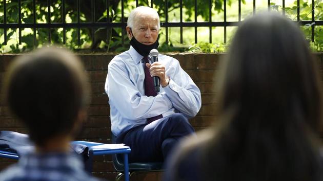 Democratic presidential candidate former Vice President Joe Biden, center, speaks to Stacie Ritter, right, and her son, Jan, during a meeting with families who have benefited from the Affordable Care Act in Lancaster. (AP) Democratic presidential candidate former Vice President Joe Biden, center, speaks to Stacie Ritter, right, and her son, Jan, during a meeting with families who have benefited from the Affordable Care Act in Lancaster. (AP)