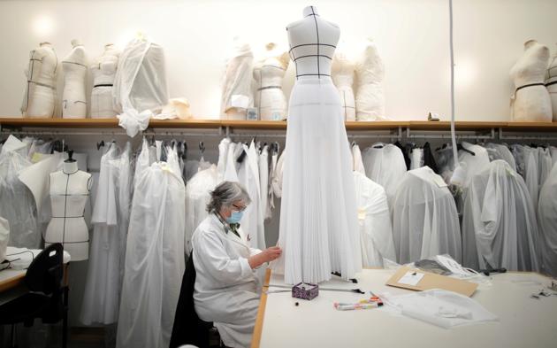 A seamstress works at Dior workshop ahead of the Haute Couture Online Fall/Winter 2020/2021 collection presentation by designer Maria Grazia Chiuri for fashion house Dior in Paris, France, July 4, 2020. (REUTERS)