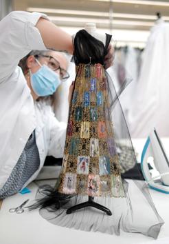 A seamstress works on a creation at Dior workshop ahead of the Haute Couture Online Fall/Winter 2020/2021 collection presentation by designer Maria Grazia Chiuri for fashion house Dior in Paris, France, July 4, 2020. (REUTERS)