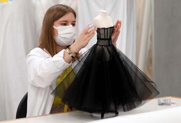 A seamstress works at Dior workshop ahead of the Haute Couture Online Fall/Winter 2020/2021 collection presentation by designer Maria Grazia Chiuri for fashion house Dior in Paris, France, July 4, 2020. (REUTERS)
