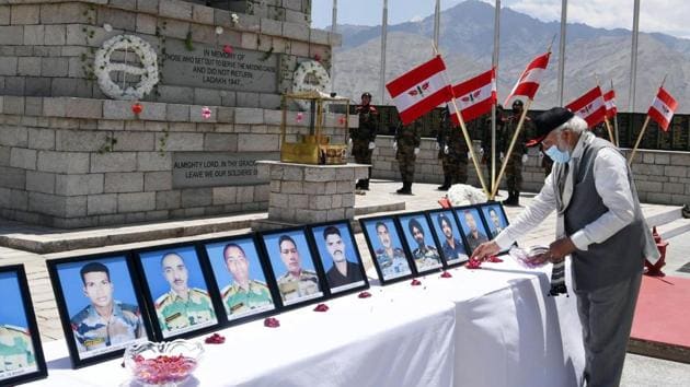 Prime Minister Narendra Modi paying tributes to martyrs who lost their life in Galwan Valley Clash of June 15, during his visit to Ladakh, at Nimu in Leh on July 3, 2020.(ANI file photo)