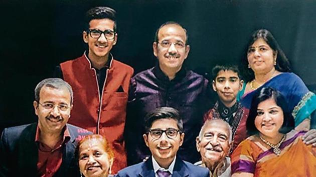 Subhash Nagpal (extreme left) with his family; (right) donating plasma on his 54th birthday on Tuesday as a tribute to his parents; his mother would perform a ‘havan’ every year on his birthday.