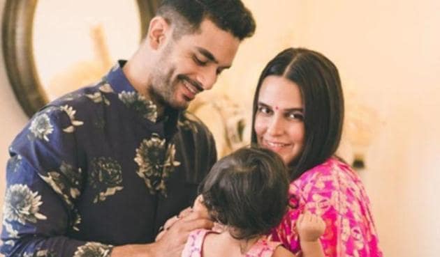 Angad Bedi and Neha Dhupia with daughter Mehr. Angad Bedi and Neha Dhupia with daughter Mehr.