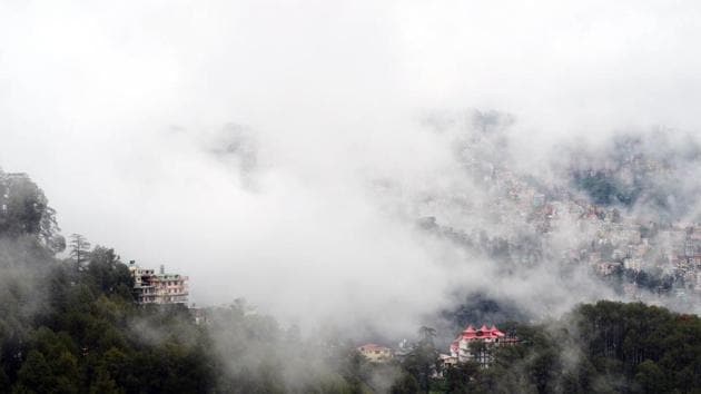 Clouds hovering over Shimla town after rain on Wednesday. (Deepak Sansta/HT) Clouds hovering over Shimla town after rain on Wednesday. (Deepak Sansta/HT)