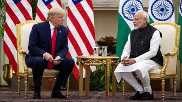 Prime Minister Narendra Modi speaks to US President Donald Trump during a meeting at Hyderabad House in New Delhi in February 2020.(Reuters File Photo)