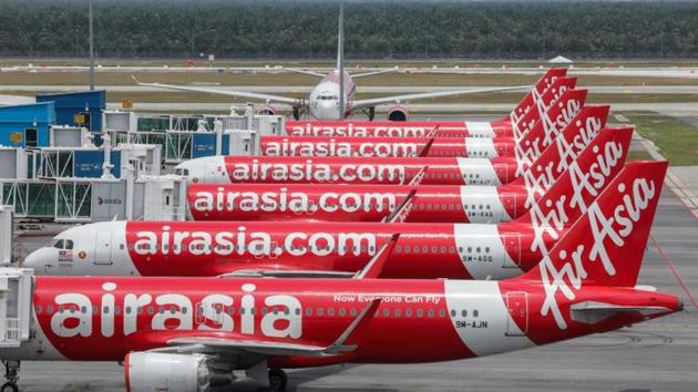 AirAsia planes are seen parked at Kuala Lumpur International Airport 2, during the movement control order due to the outbreak of the coronavirus disease, in Sepang, Malaysia.(REUTERS) AirAsia planes are seen parked at Kuala Lumpur International Airport 2, during the movement control order due to the outbreak of the coronavirus disease, in Sepang, Malaysia.(REUTERS)