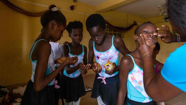 Students prepare for a rehearsal at the Leap of Dance Academy on July 3. Ajala recalled how locals in the neighbourhood of Ajangbadi were sceptical at first about his plan to teach ballet. “When we started ballet here, people were like ‘what are they doing? Is it not indecent? It’s not a Christian dance!’” (Benson Ibeabuchi / AFP)