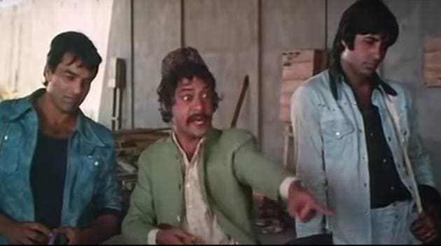 Jagdeep with Amitabh Bachchan and Dharmendra in the iconic scene from Sholay.